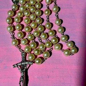 A lovely faux pearl rosary.
